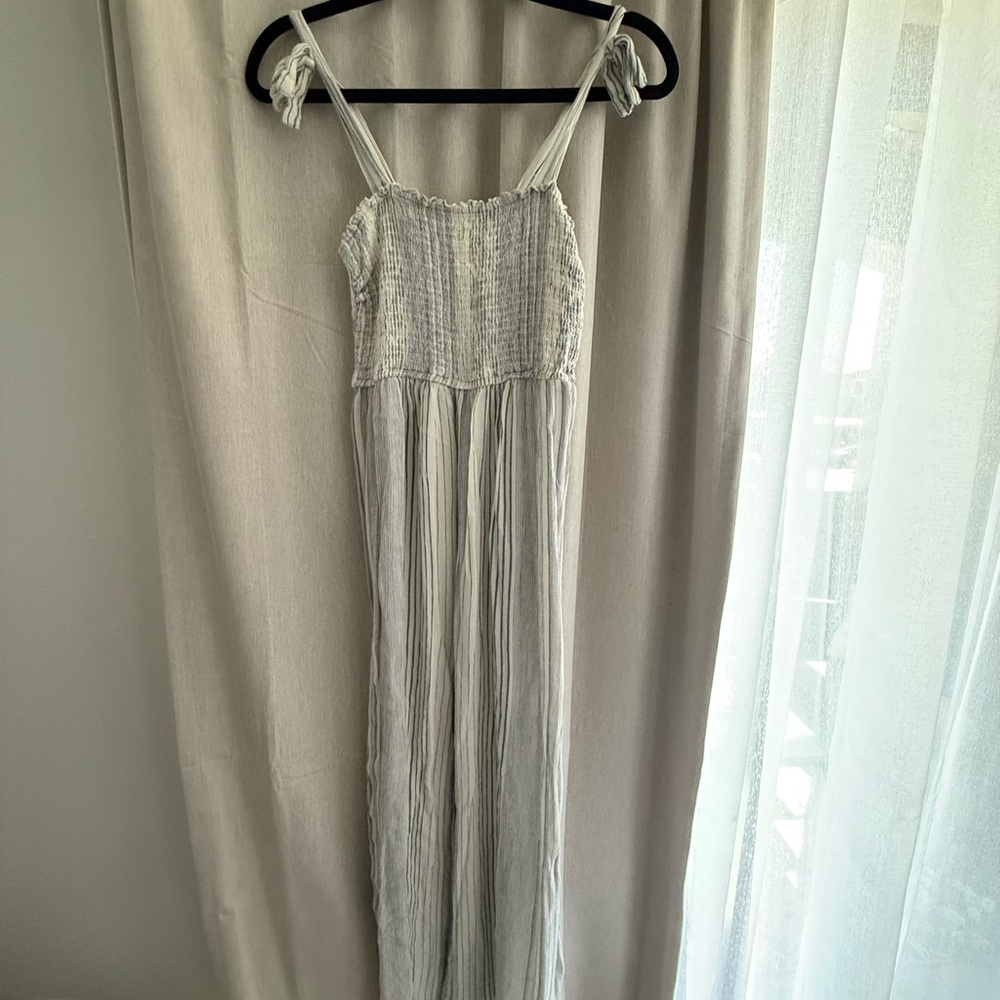 Chic Cream Jumpsuit with Smocked Bodice